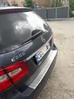 Mercedes E-sarja W212 2009–2016 OmsaLine takapuskurin suojalista (2009-2013, SW, ruostumaton teräs) kuva 1