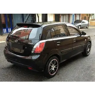 Spoileri (maalattava) Kia Rio 2012–2017