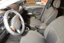 Geely Emgrand X7 2011– Uutuus! Brothers Premium -keinonahkaiset istuinsuojat kuva 1