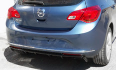 Opel Astra J 2009–2015 Takadiffuusorin peiteosa (maalattava) kuva 1