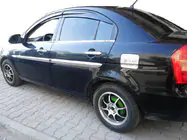 Hyundai Accent 2006–2010 Kromiset ovenkahvan suojakuoret (4 kpl) Carmos - turkkilainen teräs kuva 3