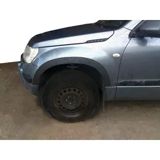 Lokasuojan kaarilevikkeet (4 kpl, mustat) Suzuki Grand Vitara 2005–2017 kuva 1
