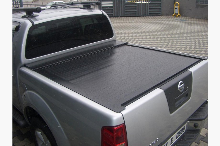 Nissan Navara 2006–2015 Rullaluukut Image