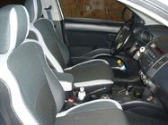 Mitsubishi Outlander 2006–2012 Ekonahkaiset istuinsuojat SoyuzAuto Premium kuva 1