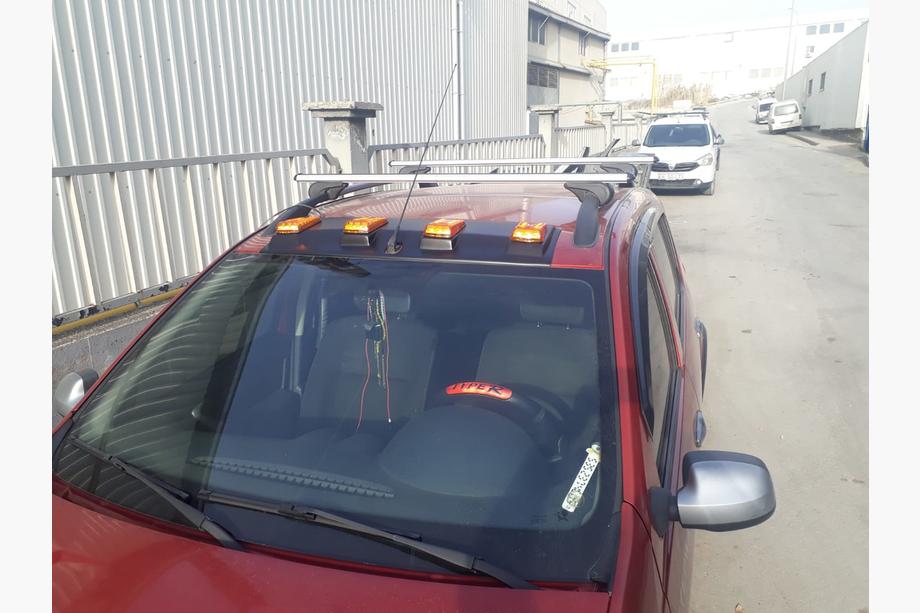 Renault Sandero 2007–2013 Tuulilasin aurinkolippa (LED, mattamusta) Image