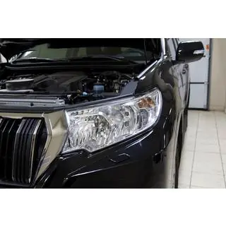 Ajovaloluomi (kuljettajan puoli, heijastinajovaloon) Toyota Land Cruiser Prado 150 2009–2023 kuva 1