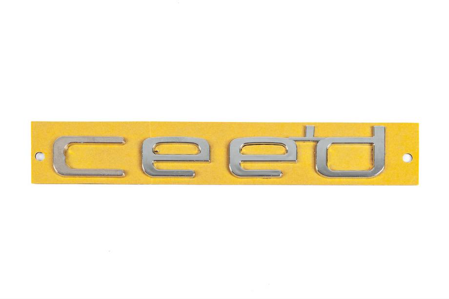 Kia Ceed 2012–2018 Ceed-teksti 86320-A2200 (25 x 151 mm) Image