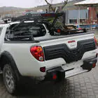 Mitsubishi L200 2006–2015 Muovinen lista takaluukun kanteen kuva 1