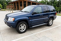 Jeep Grand Cherokee WJ 1999–2004 Sivuporrastangot Vision New Black (2 kpl, alumiini) kuva 1