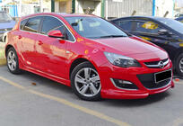Opel Astra J 2009–2015 Etupuskurin lip-spoileri DPT V-3 (maalattavaksi) kuva 1