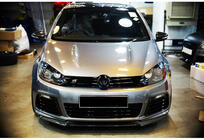 Volkswagen Golf 6 2008–2014 Etupuskurin lip-spoileri DPT V-1 (musta kiiltävä) kuva 1