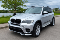 BMW X5 E70 2007–2013 Etupuskurin lippa (2010-2013, maalattava) kuva 1