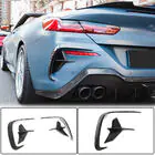 BMW 8-sarja G14/G15/G16 2018– Aerodynaamiset takapuskurin diffuusorin lisäosat V2 (M-Sport, hiilikuitu) kuva 1
