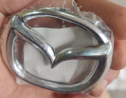 Mazda Poistotuote Mazda-embleemi (65 x 50 mm) kuva 3