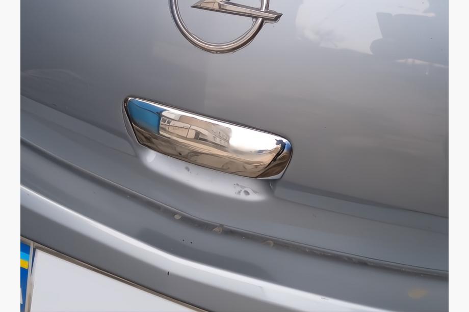Opel Corsa D 2007–2014 Takaoven kahvan suojus (ruostumaton teräs) OmsaLine - italialainen ruostumaton teräs Image