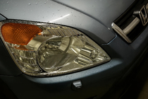 Honda CRV 2001–2006 Ajovalojen kromilistat (2 kpl, muovi) kuva 1