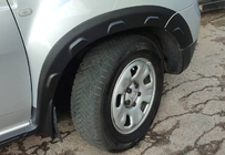 Dacia Duster 2008–2018 Lokasuojan kaarilevikkeet ulokkeilla (8 kpl, muovi) kuva 11