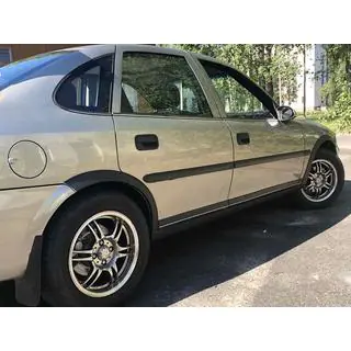 Lokasuojan kaarilevikkeet (4 kpl, mustat) kuva 1
