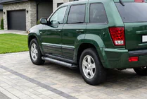 Jeep Grand Cherokee WK 2004–2010 Sivuastinlaudat New Vision Black (2 kpl, alumiini) kuva 1