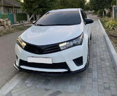Toyota Corolla 2013–2019 Etupuskurin lip (musta) kuva 3