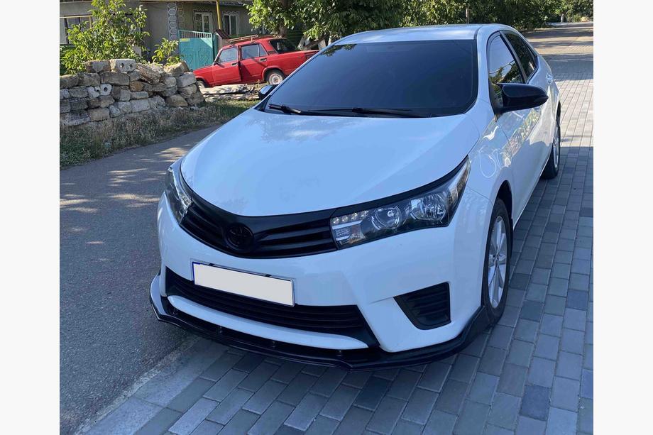 Toyota Corolla 2013–2019 Etupuskurin lip (musta) Image