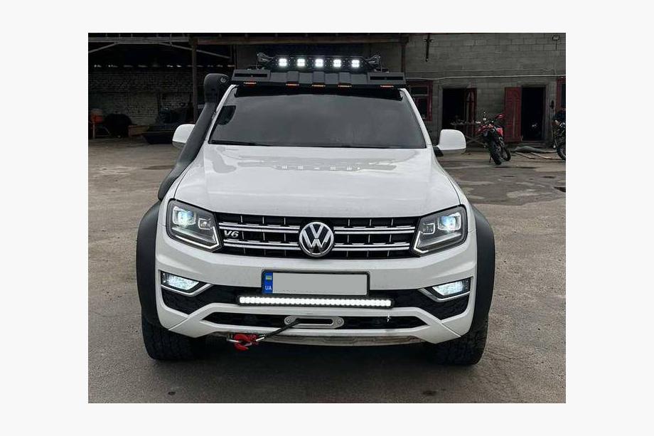 Volkswagen Amarok 2010–2022 Tuulilasin aurinkolippa kattotelineeseen DAKAR (LED) Image