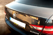 Skoda Superb 2015–2024 LIP-spoileri (Sunplex, musta) (119,2 cm x 7,3 cm) kuva 1