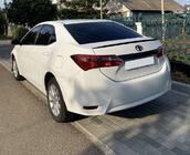 Toyota Corolla 2013–2019 LIP-spoileri (Sunplex, musta) (118 cm * 6,4 cm) kuva 1