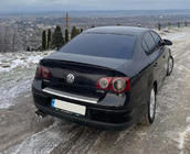Volkswagen Passat B6 2006–2012 LIP-spoileri (Sunplex, musta) (115,8 cm x 6,3 cm) kuva 1