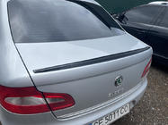 Skoda Superb 2009–2015 LIP-spoileri (Sunplex, musta) (115,8 cm x 6,3 cm) kuva 1