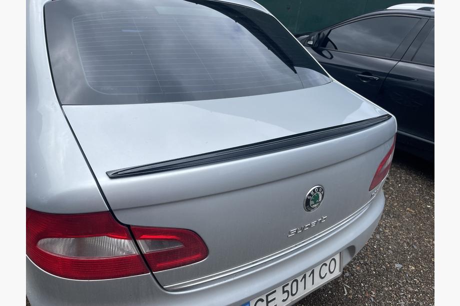 Skoda Superb 2009–2015 LIP-spoileri (Sunplex, musta) (115,8 cm x 6,3 cm) Image