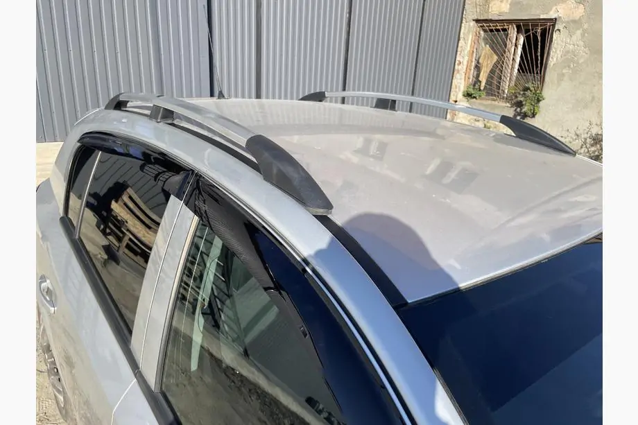Opel Astra H 2004–2013 Alumiiniset kattokaiteet (HB, kromi) Kuva 12